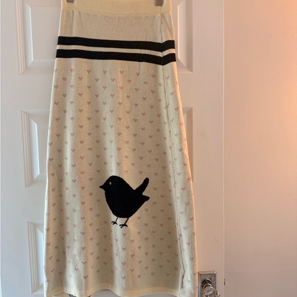 Elegant Cream Maxi Skirt with Black Bird Design